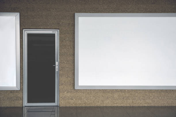 istock Silver door locating near big board 955686930