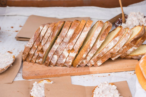 istock A large loaf of traditional bread cut into sandwiches 955687498
