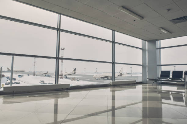istock Wide hall of airport with chairs 955690982