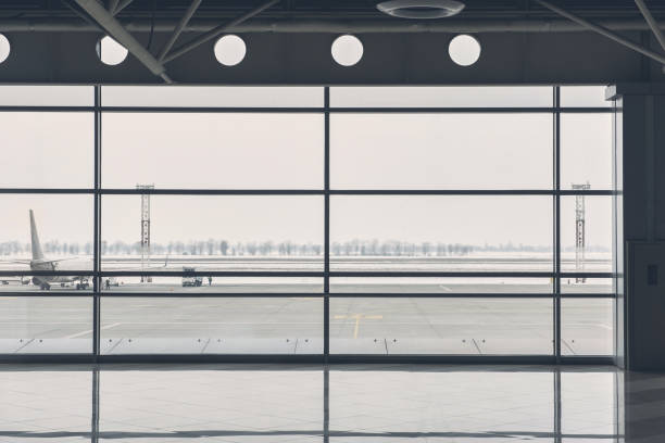 istock Huge aircraft opposite bright glass 955691138