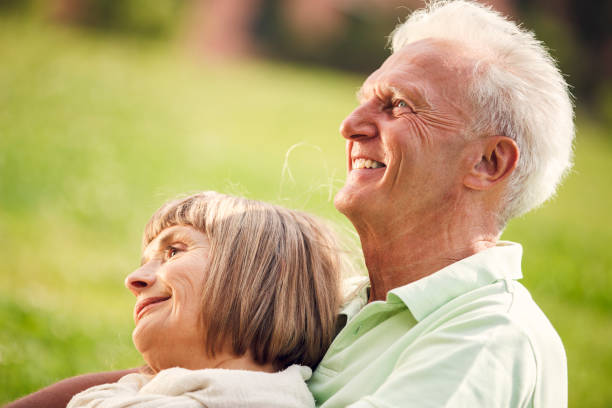 istock Happy Senior Couple Having Picnic In Town 955698936