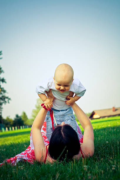 istock Young mother with her baby boy 95571183