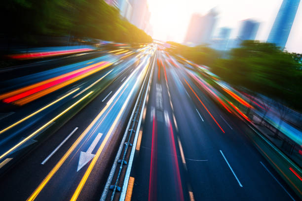 istock Car light tail in city street 955727668