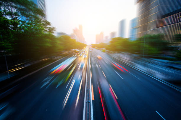 istock Car light tail in city street 955727752