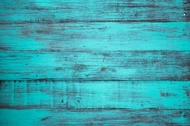 istock Blue color, grunge old scratched wood board textured background 955729388