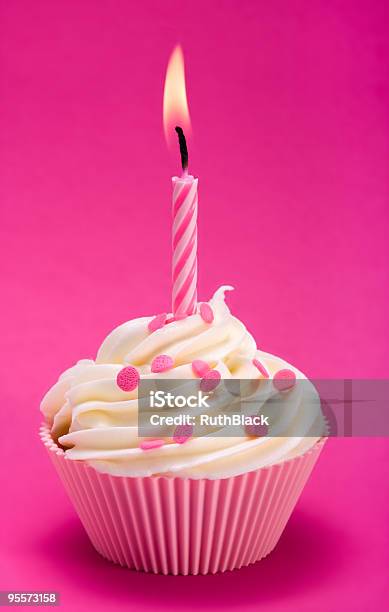 A Pink Birthday Cupcake On A Pink Background Stock Photo - Download Image Now - Baked, Birthday, Burning