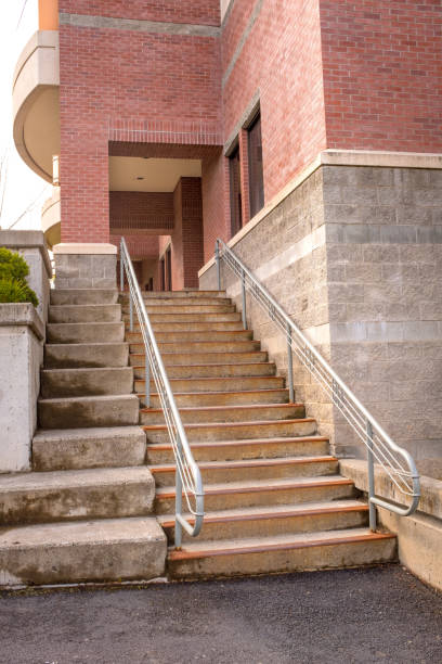 istock University stairs made of cement leading into a brick building 955736820