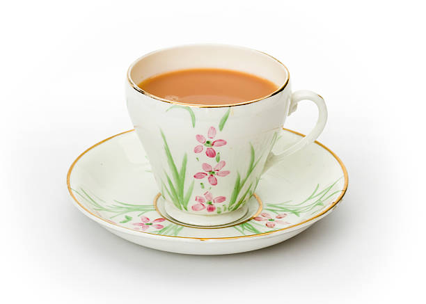 istock Tea served in a hand painted cup and saucer 95574729