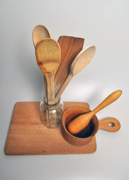 istock kitchen accessories - wooden spatulas, spoons, mortar 955747836