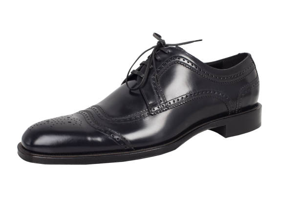 istock Elegant black shoes on a white background. 955748092