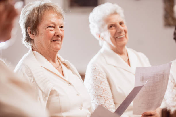 istock Senior Women at Choir Practice 955748820