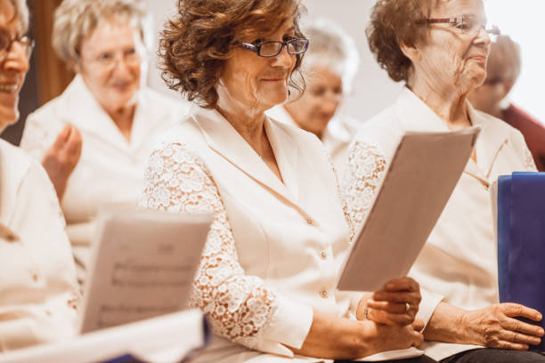 istock Smiling Senior Women at Choir Practice 955748842
