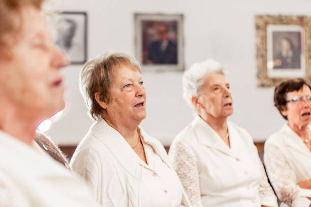 istock Senior Women at Choir Practice 955748862
