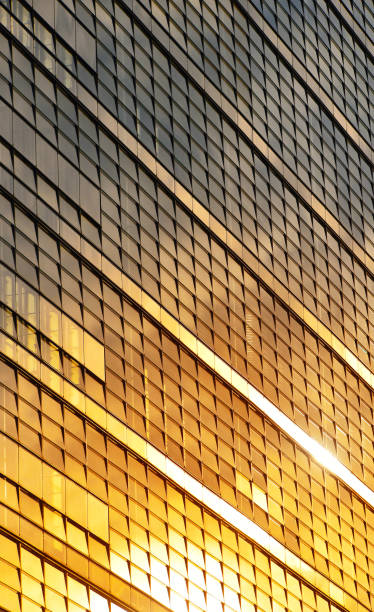 istock Modern business building glass windows at sunset 955749698