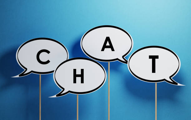 istock White Chat Bubbles With Wooden Sticks On Blue Background 955756240