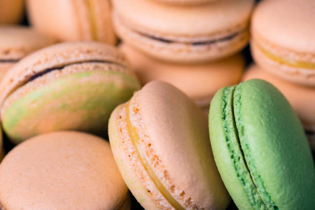 istock Many colored sweet macaroons cookie. Can be used as a background. Selective focus 955760488