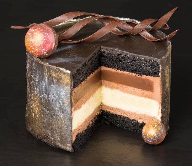 istock chocolate cake handmade beautifully decorated on a dark background. Selective focus 955761000