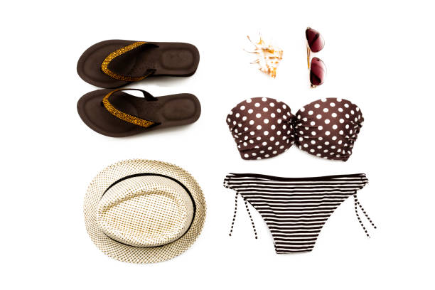 istock Woman swimsuit beach accessories collage on white background, flat lay, top view 955764086