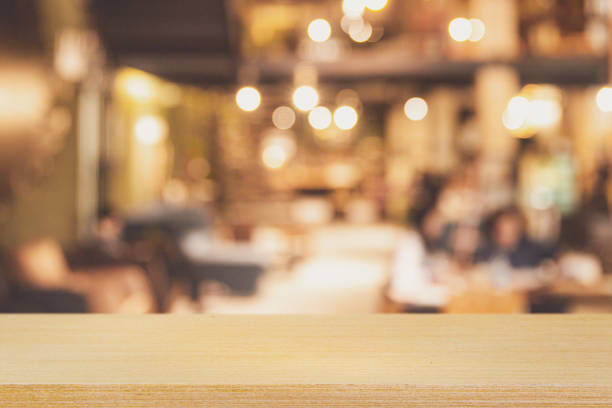 istock Empty Table top Counter with Blurred People and Restaurant, cafe, or coffee Shop. 955768908
