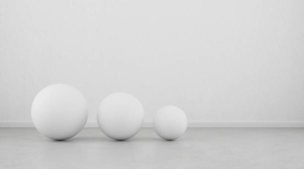 Abstract of white geometric sphere balls are on clean concrete floor and wall background.3d rendering Abstract of white geometric sphere balls are on clean concrete floor and wall background.3d rendering white units stock pictures, royalty-free photos & images