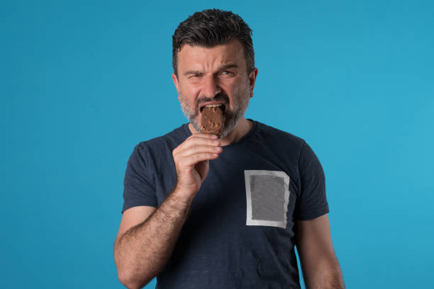 istock Mid adult man experiencing tooth ache 955771282