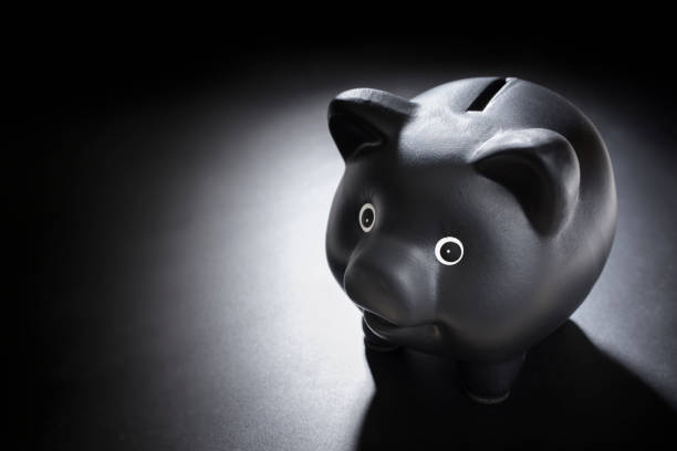 black piggy bank - savings finance education mortgage imagens e fotografias de stock