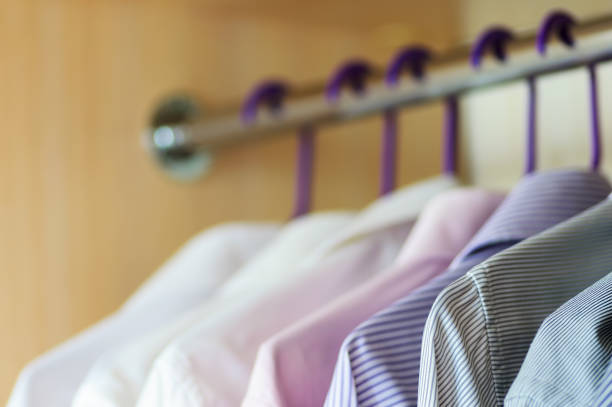 Clothes in home closet close-up view