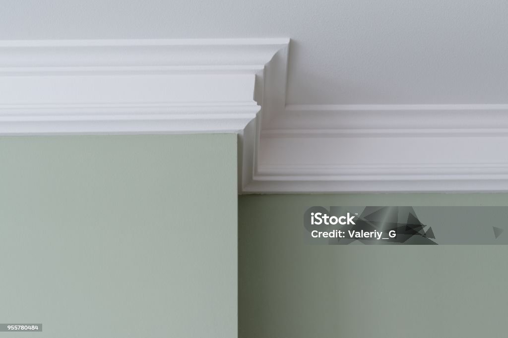 Ceiling moldings in the interior Ceiling moldings in the interior, a detail of intricate corner. Moulding - Trim Stock Photo