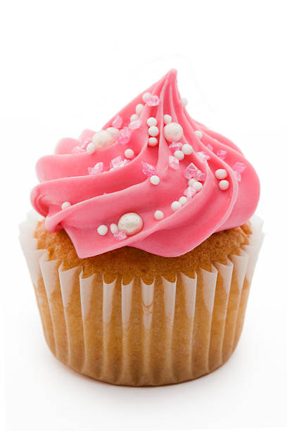 istock Cupcake with pink frosting and white and pink decorations 95578367