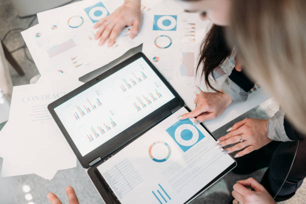 istock meeting business team brainstorm document info 955784304