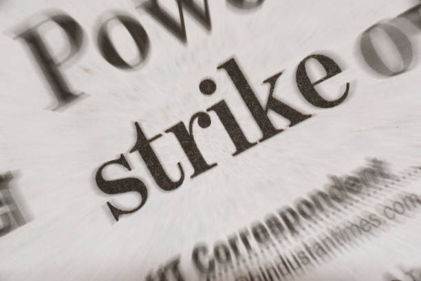 istock Strike news headline in newspaper 955784336