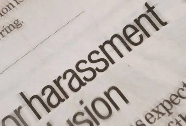 Photo of Harassment headline in newspaper