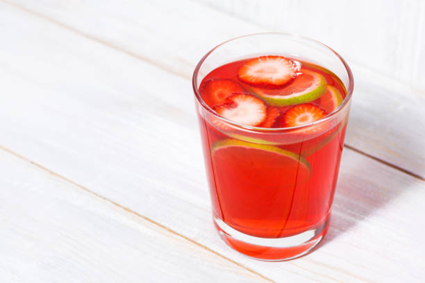 istock strawberry citrus lemonade on a white background, closeup 955787562