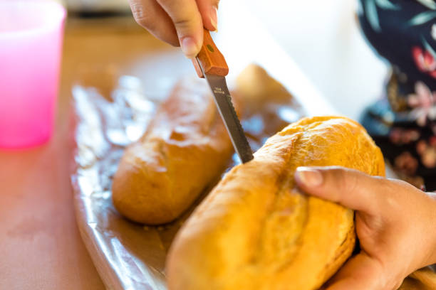 istock woman preparing sandwich 955790402