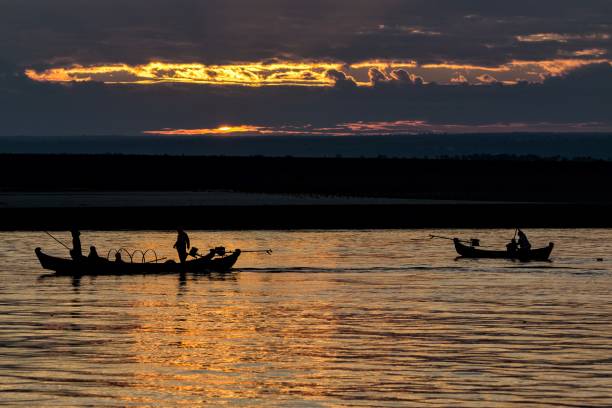 istock Fishermen on the Irrawaddy River, Myanmar 955795548