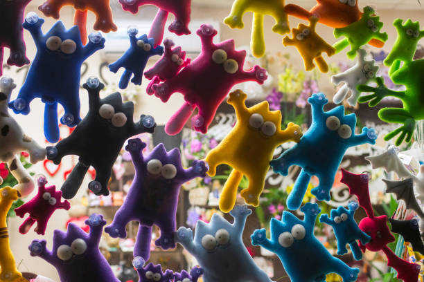Soft toys on suction cups in the window
