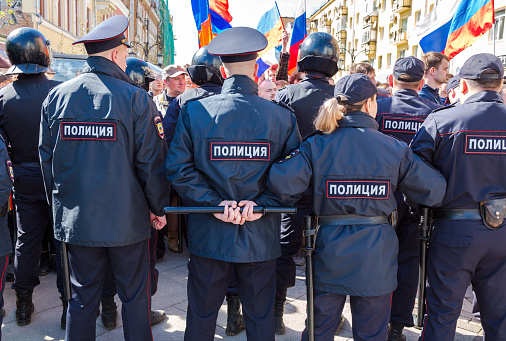 Samara, Russia - May 5, 2018: Police officers block an Leningradskaya street during an opposition protest rally ahead of President Vladimir Putin's inauguration ceremony