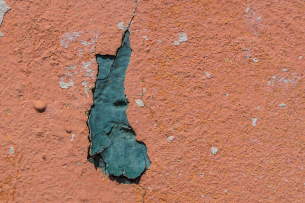istock Concrete  wall  textured background  with  peeling off paint. 955800096