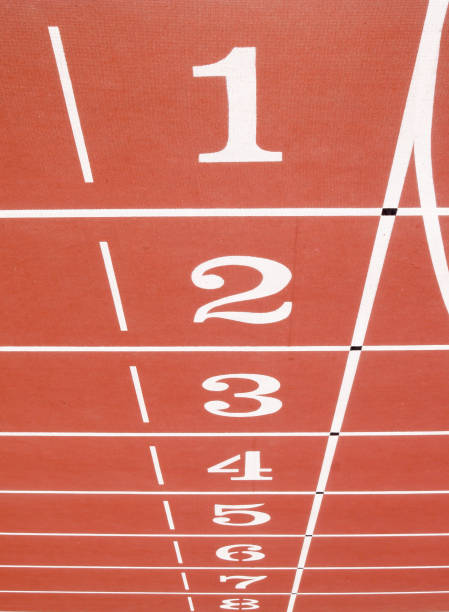 istock Red synthetic athletic track close-up 955801842