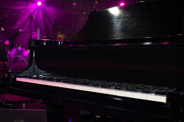 istock Stage with magenta lights and microphones ready for concert 955808100