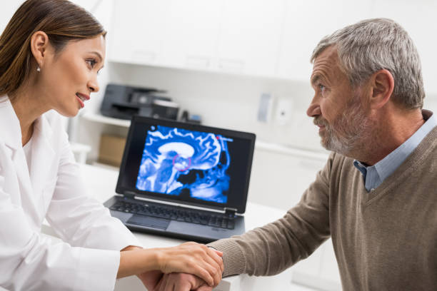 istock Female Doctor Consoling Patient 955808874