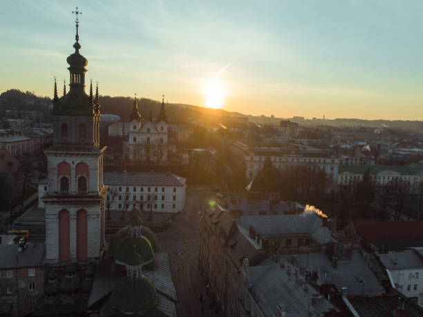 istock beauty panoramic view on sunrise over old european city 955809098