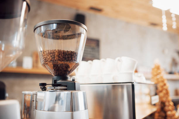 istock Professional black electric grinder is on a wooden table 955809232