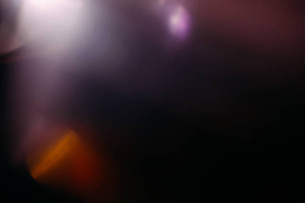istock lens flare colorful abstract light glow black 955813136