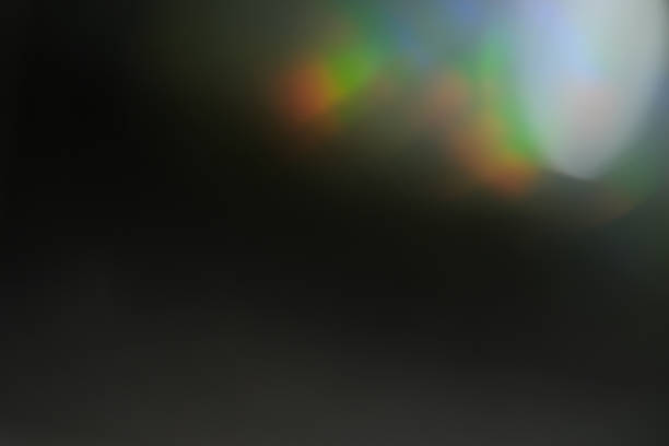 istock lens flare colorful abstract bokeh light black 955813216