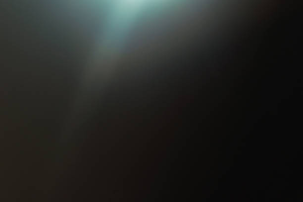 istock lens flare colorful abstract bokeh light black 955813450