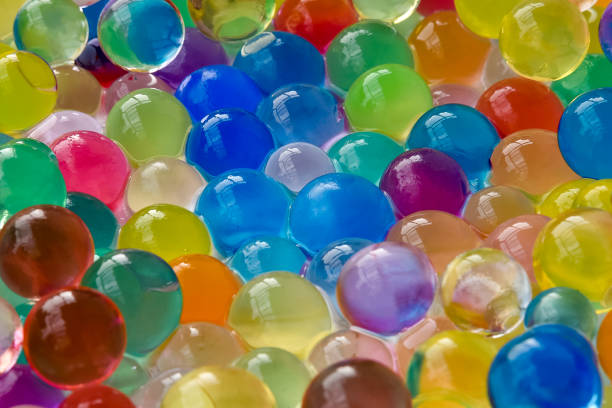 istock Background made with scattered color gel balls 955814040