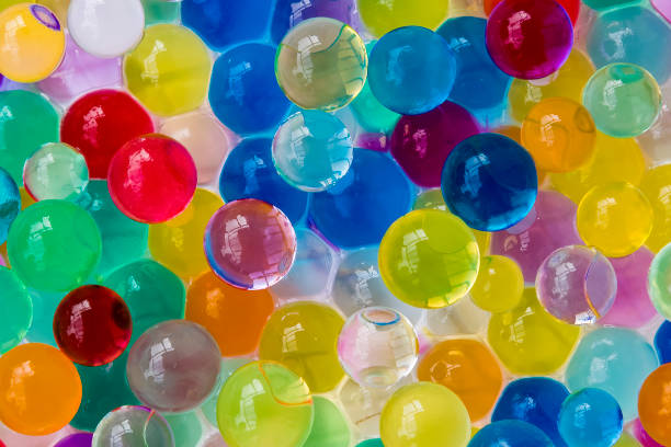 istock Background made with scattered color gel balls 955816378