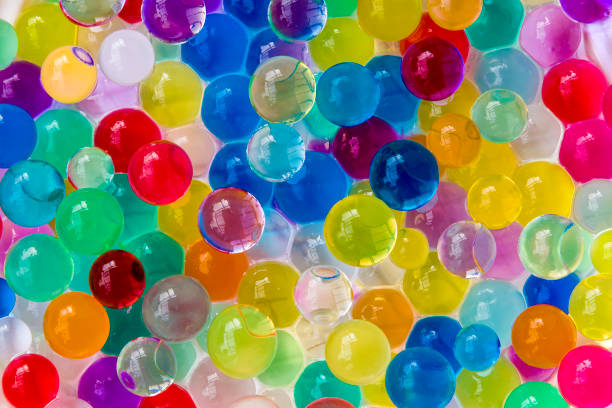 istock Background made with scattered color gel balls 955816432