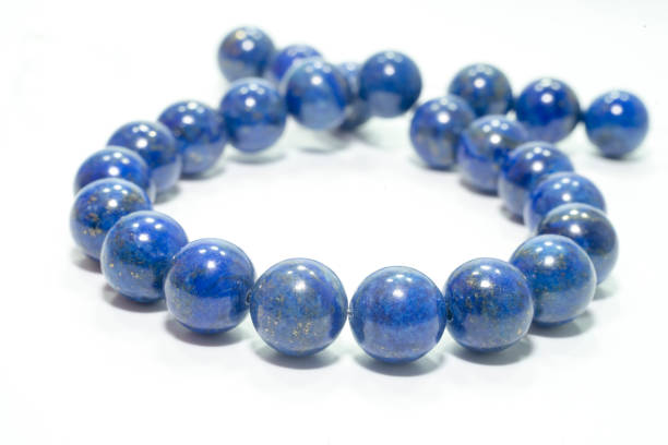 istock lapis lazuli bracelet isolated on white background. 955820136